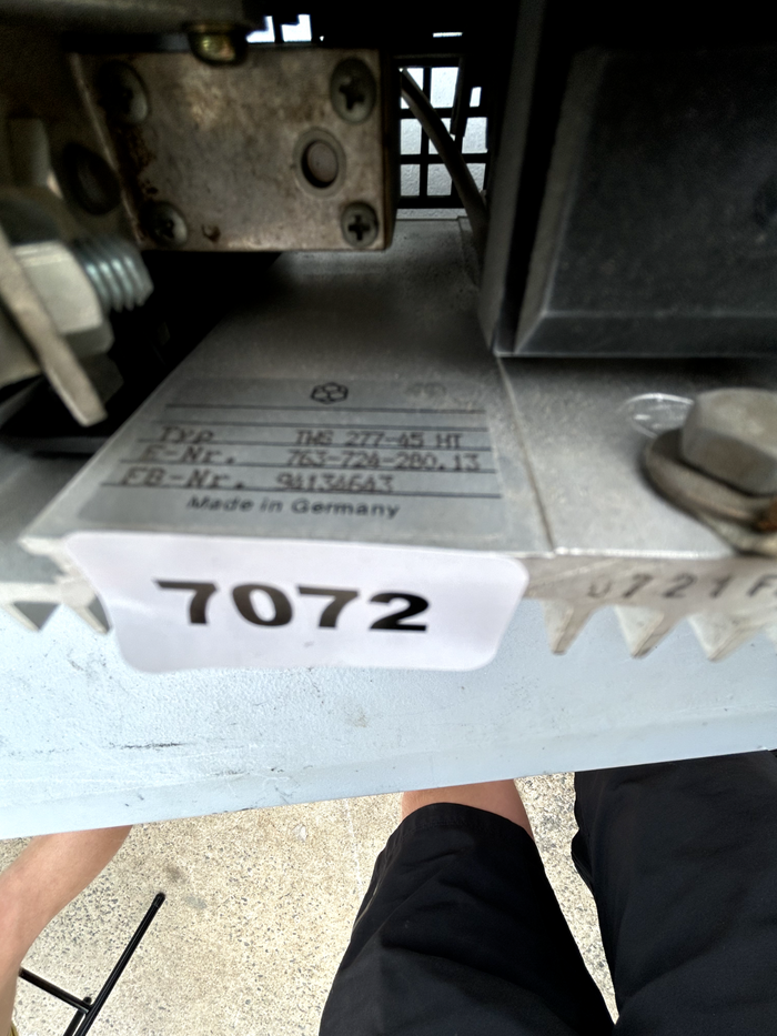 7446360